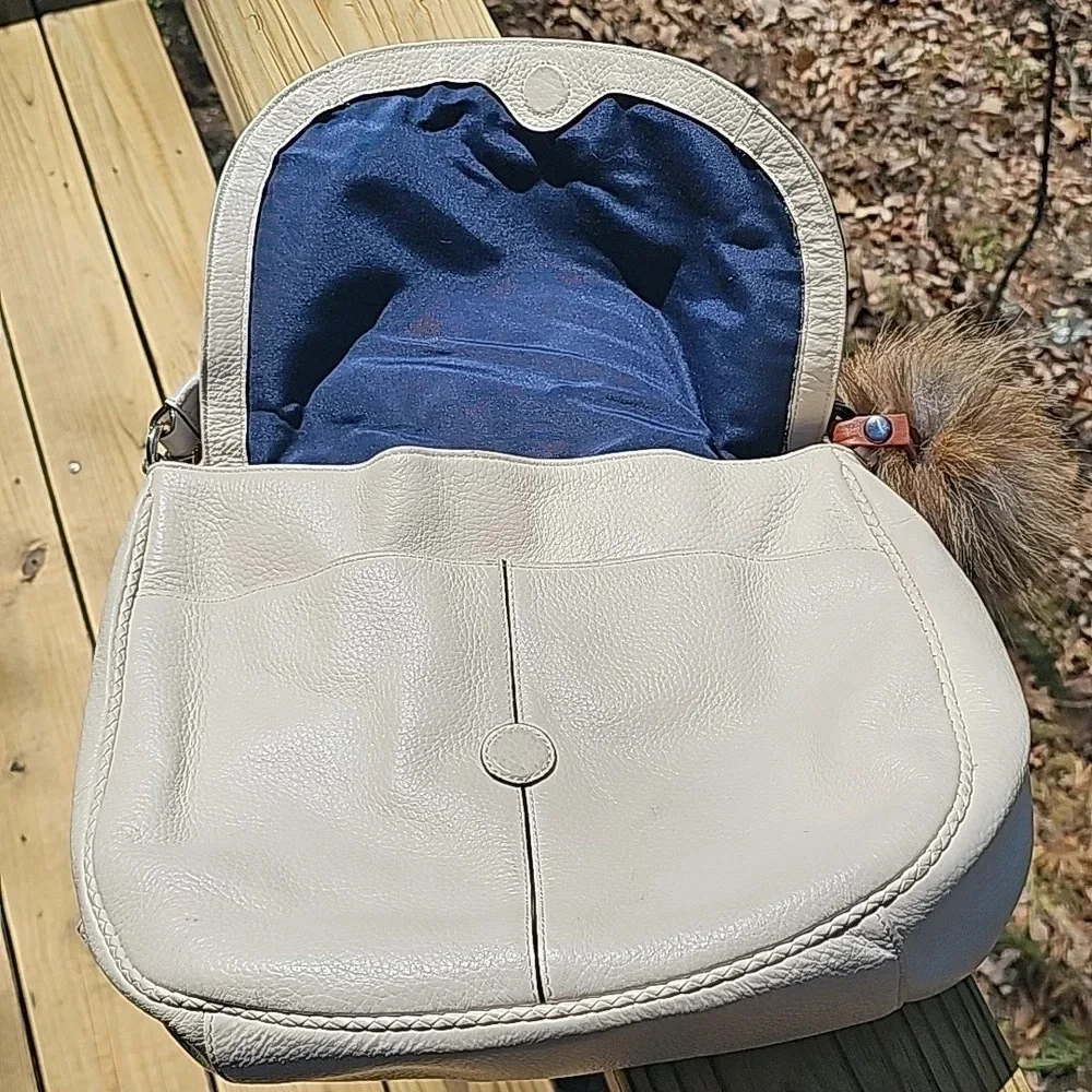 Cole Haan crossbody with fox pom